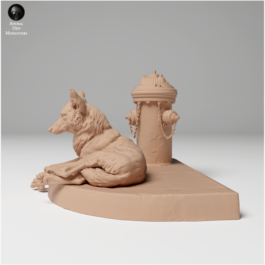 Coyote is lying in front of a hydrant from Animal den miniatures as 3D print