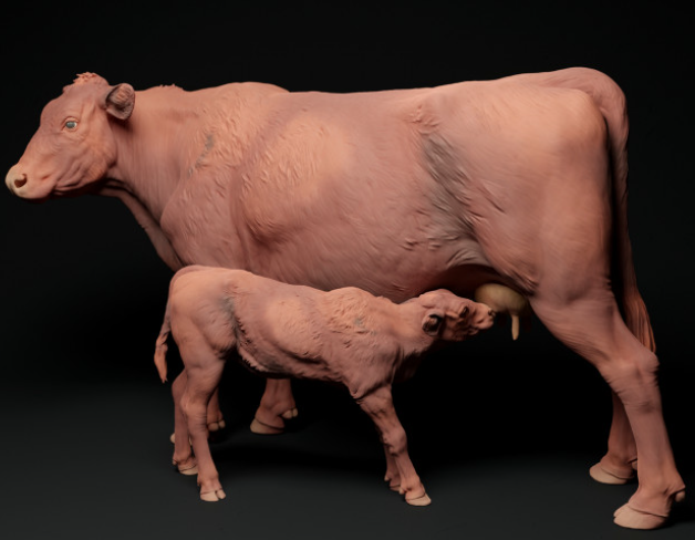 Red Devon cow feeding calf by Animal den miniatures