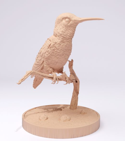 Un colibri est assis sur une branche de Animal miniatures comme impression 3D